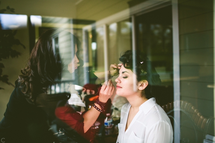 Bride getting makeup done