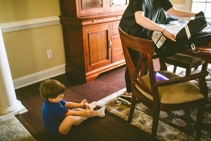 Ringbearer getting dressed