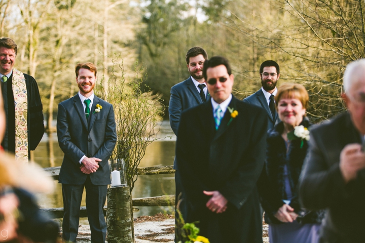 Groom's reaction watching bride walk down aisle