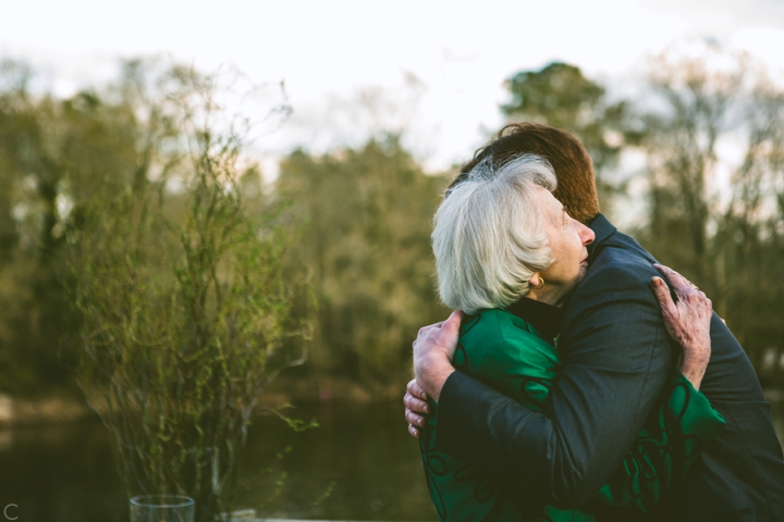 Groom hugging grandmother