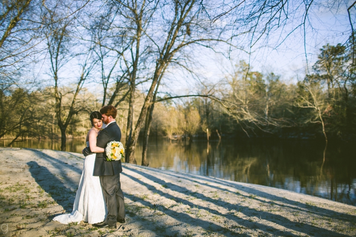 Bride and groom portrait on beach