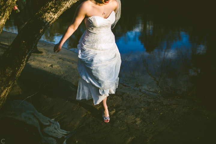 Bride walking in sand