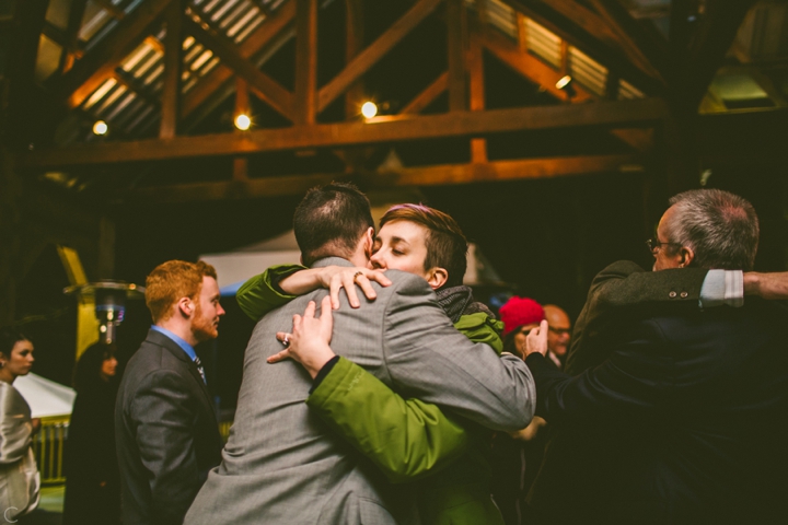 Wedding guests hugging