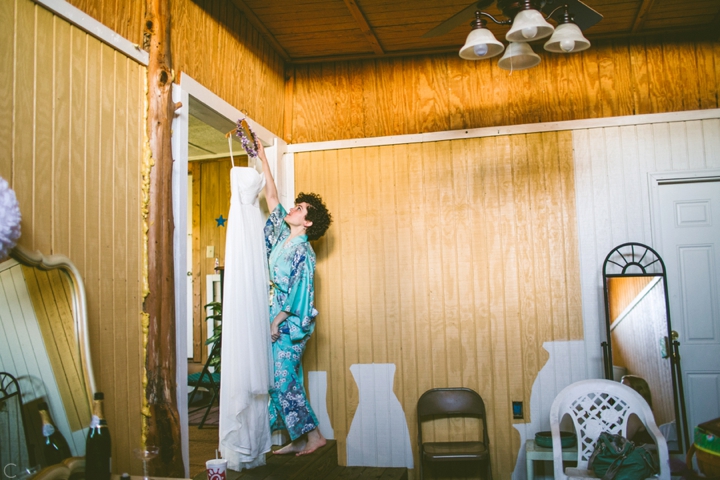 Bride getting dress