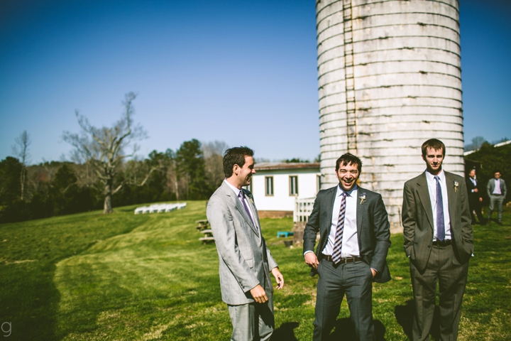 Guys laughing on farm