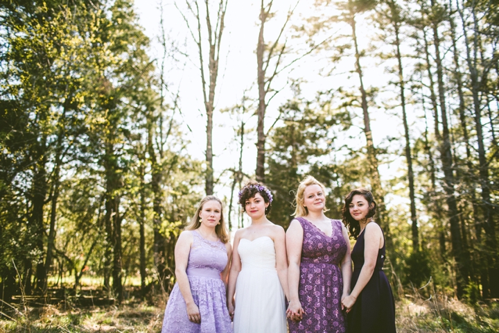 Bridesmaids in purple dresses