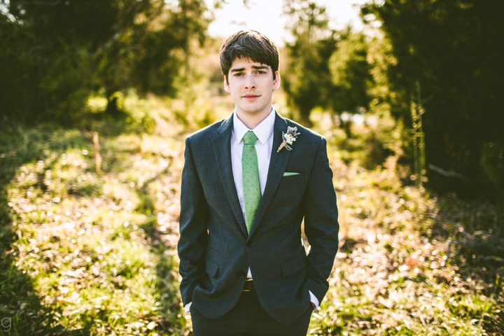 Groom portrait on farm