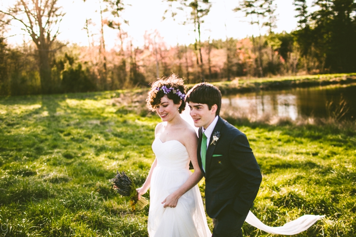 Couple walking through field