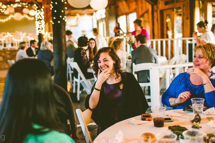 Girl laughing at wedding reception