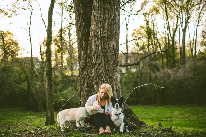 Woman playing with dogs