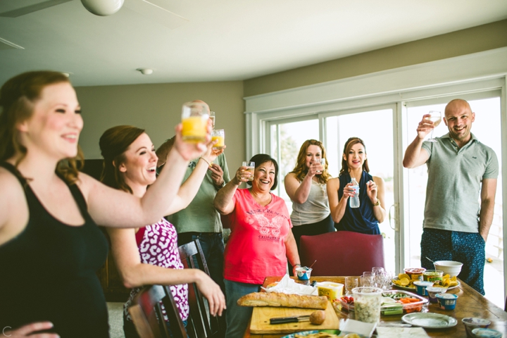 Family toasting bride