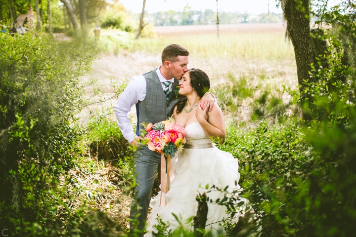 Bride and groom with moss