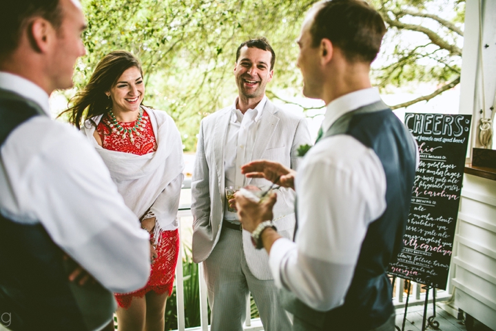 Guests laughing at wedding