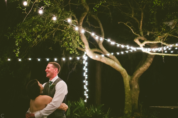 Couple portrait under string lights