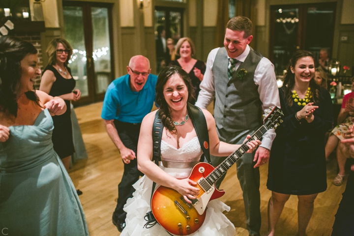 Bride playing guitar