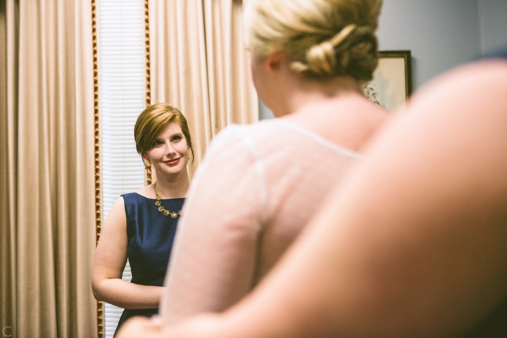 Sister looking at bride