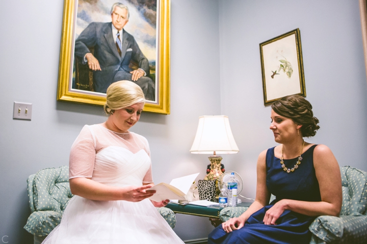 Bride reading letter from groom