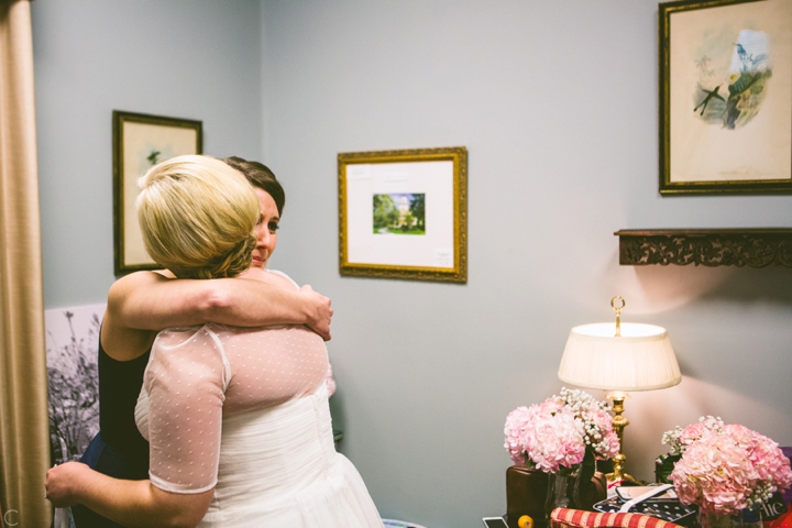 Bride hugging maid of honor