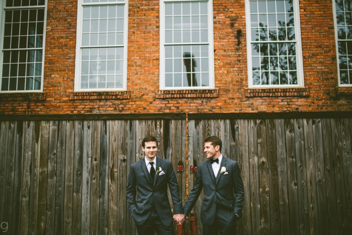 Grooms holding hands