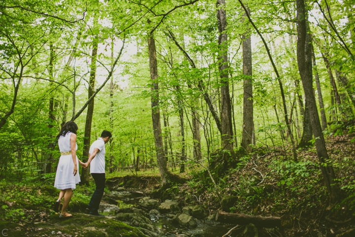 couple walking in woods