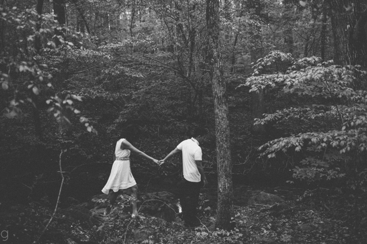 couple holding hands walking