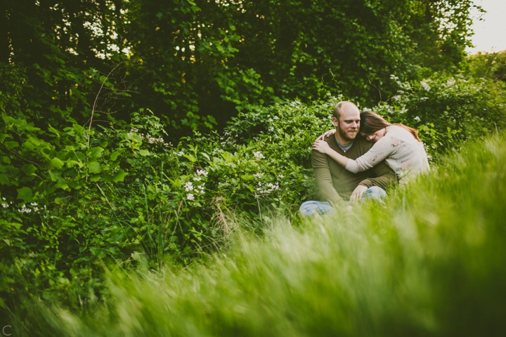 Couple sitting in grass