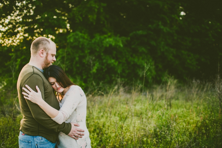 Couple standing in field