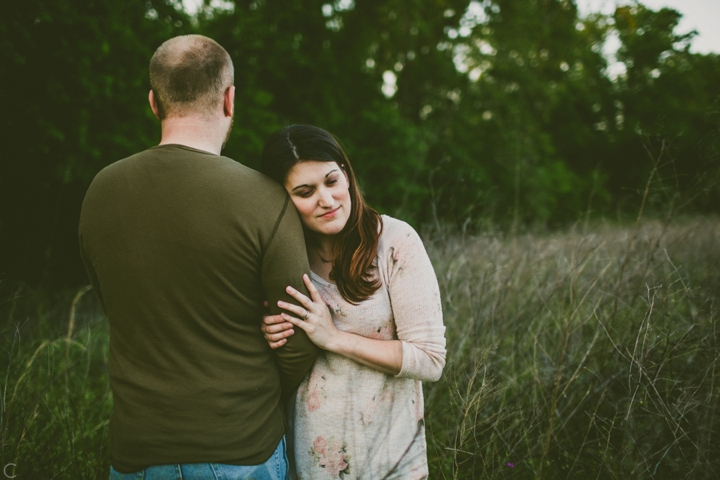 Couple standing in field