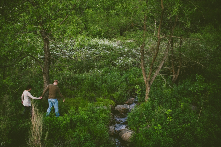 Couple walking by creek