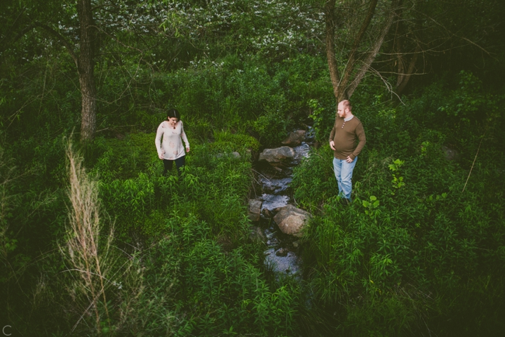 Couple walking by creek