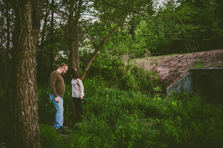 Couple walking out of woods