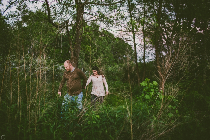 Couple walking out of woods