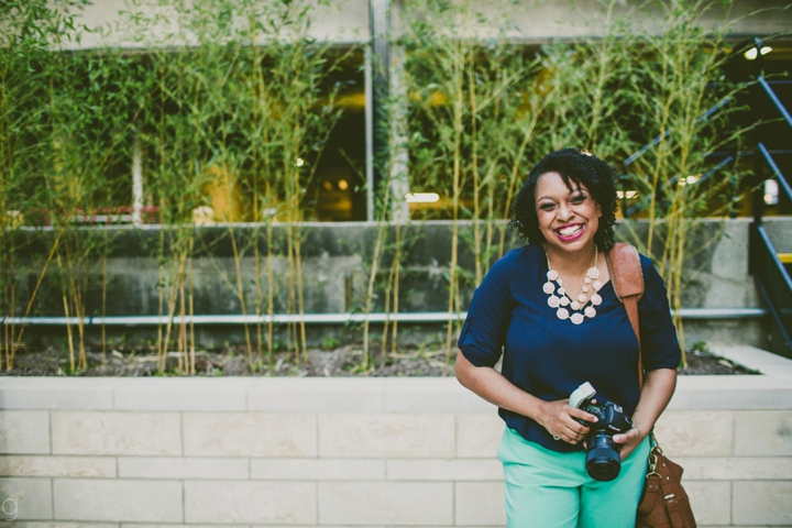 Woman laughing with camera