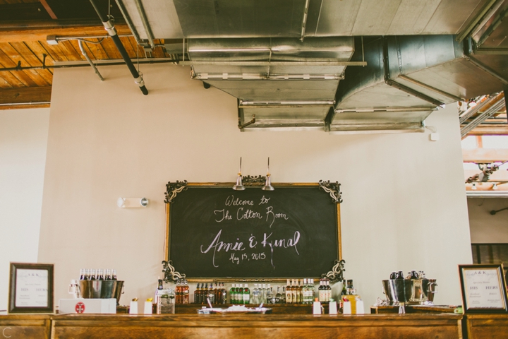 Chalkboard bar sign at wedding