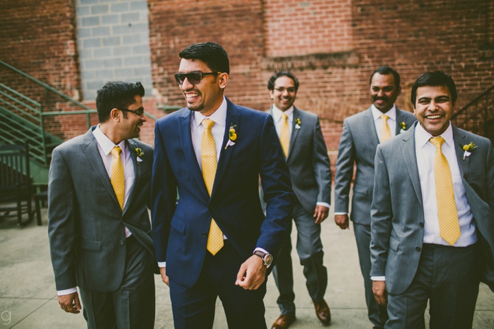 Groom walking with groomsmen