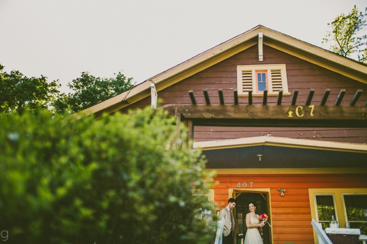 Bride and groom leaving house