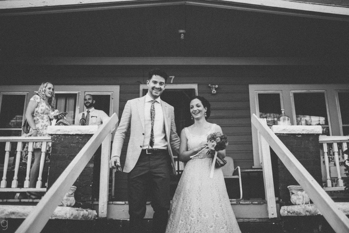 Bride and groom leaving house