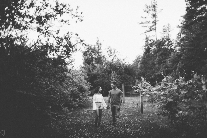 Couple walking in grass