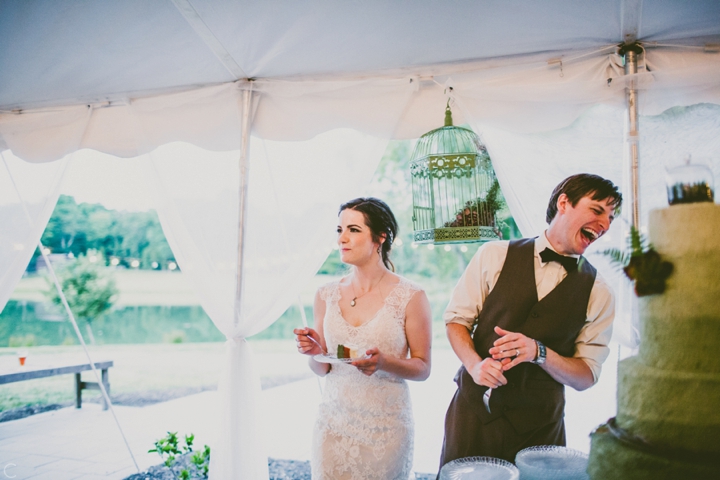 Bride and groom cutting the cake