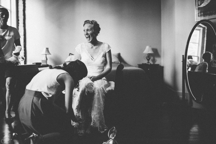 bride putting on shoes