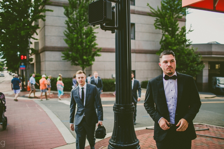 Groom walking in Durham, NC