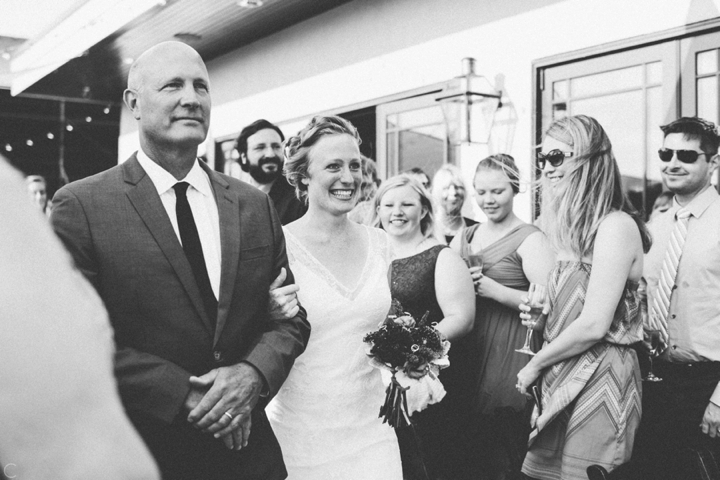 Dad walking daughter down aisle