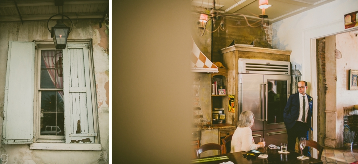 Groom standing in kitchen