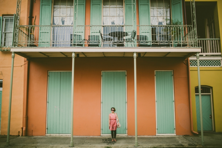girl in front of door in new orleans