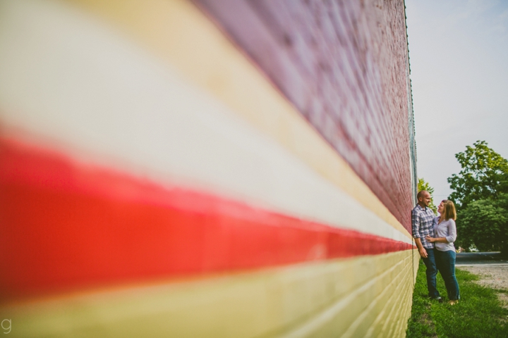 Couple standing with wall