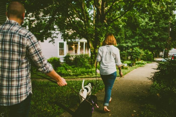 Couple walking their dogs