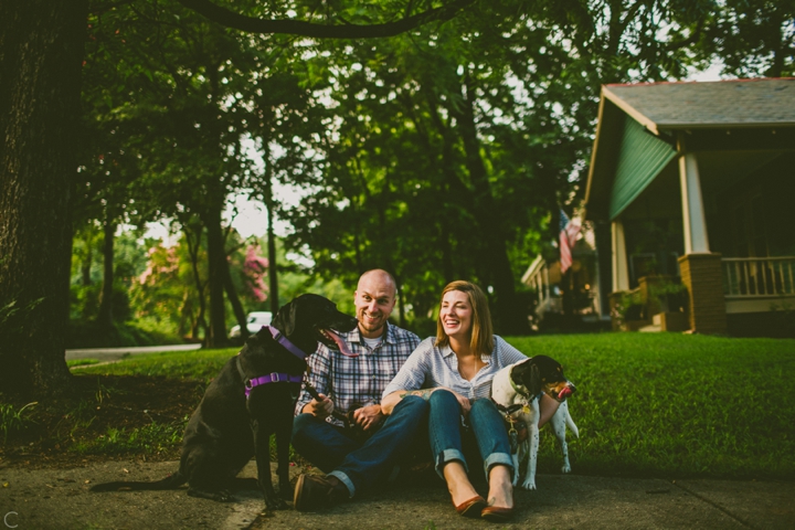 Couple sitting with their dogs