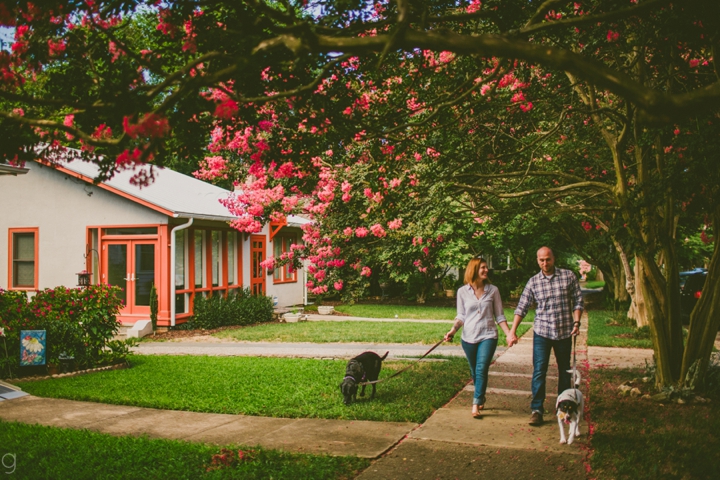 Couple walking their dog