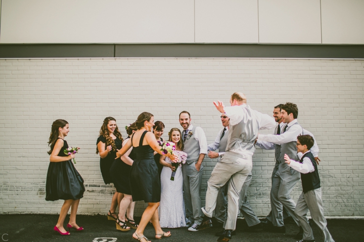 Wedding party group hug