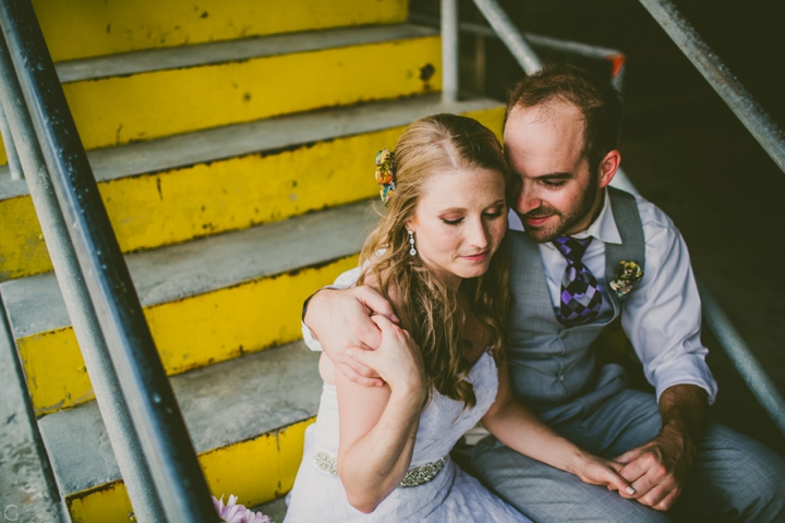 Bride and groom on yellow steps